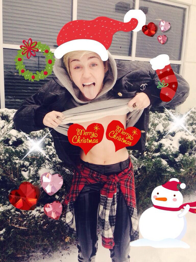 Miley Cyrus breasts exposed in Christmas photo (Free the Nipple)