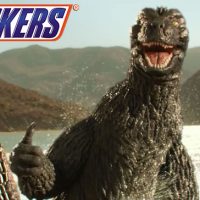 Godzilla Snickers commercial Godzilla thumbs up