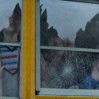 Godzilla international trailer shows new scenes of destruction (children on school bus)